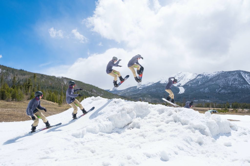 Snowboarder action shot over jump