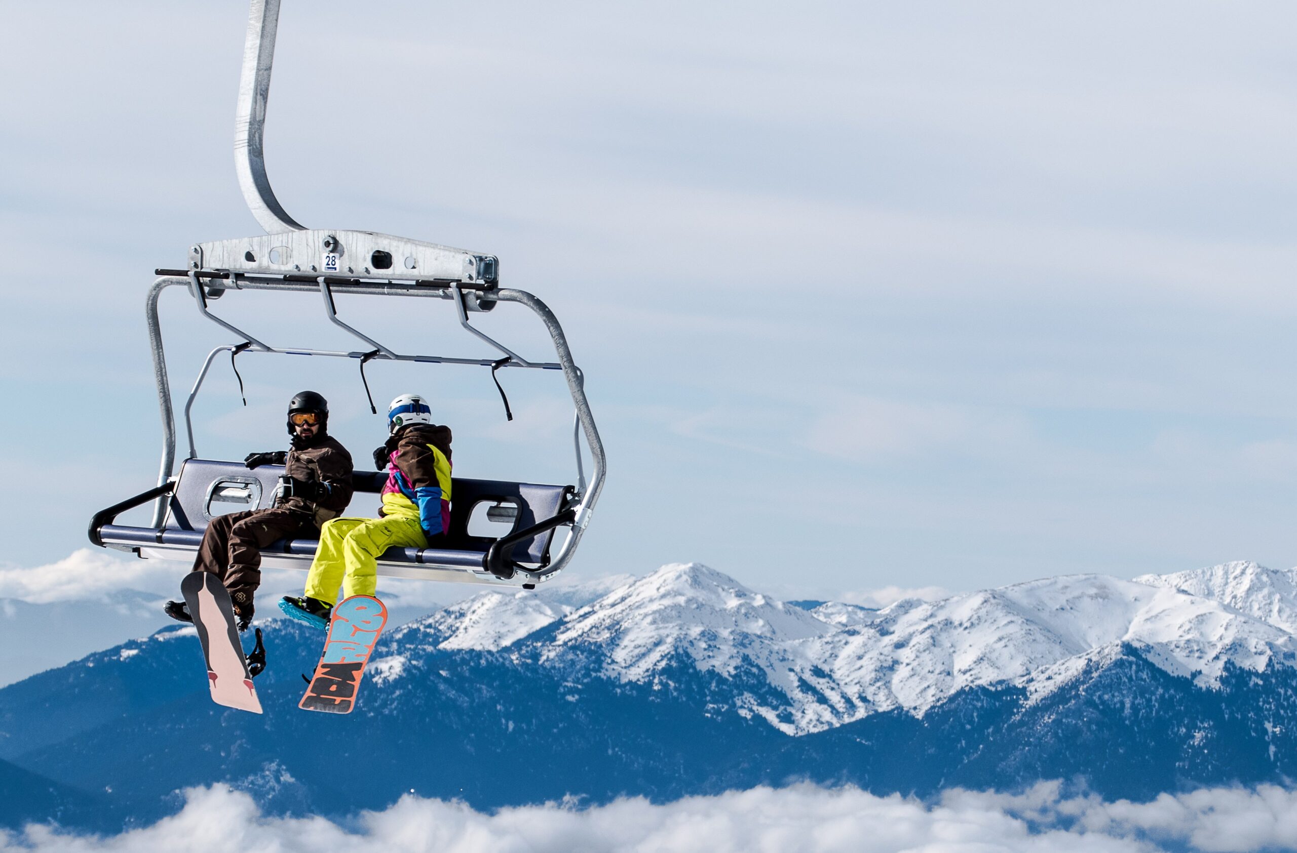 snowboarders on lift