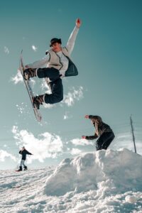 snowboarder hitting jump